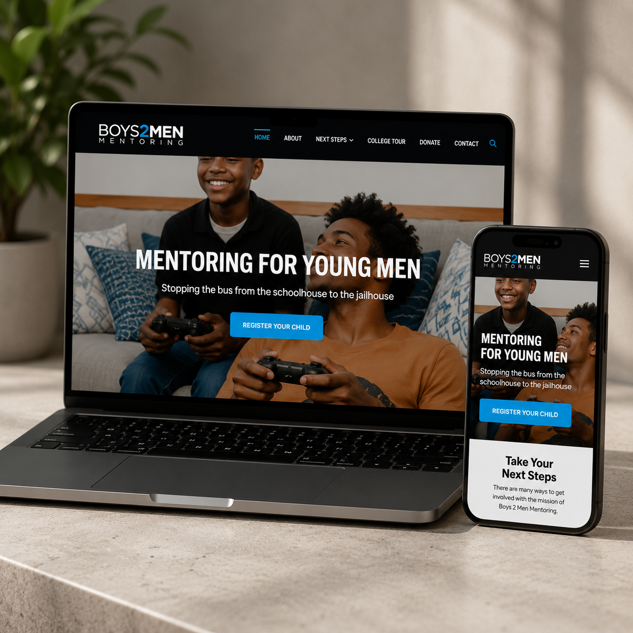 Responsive website design displayed on laptop and mobile devices for a nonprofit mentoring organization serving young men and families.